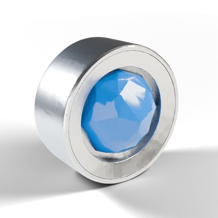 a faceted convex crystal held in a precision machined titanium cradle, like a scientific instrument